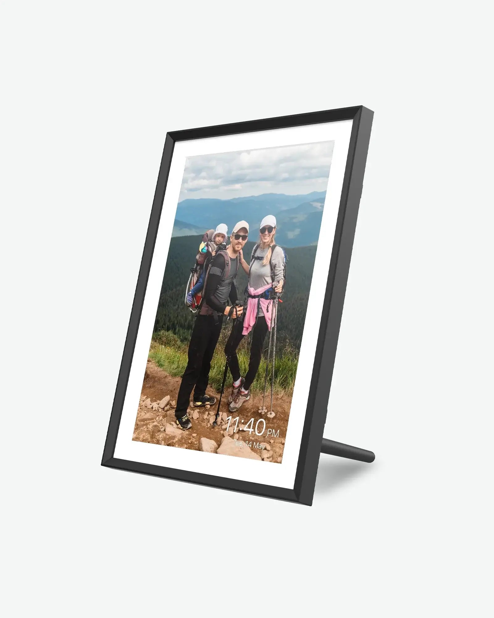 Apolosign 10.1" digital photo frame displaying a family with baby hiking, HD IPS touchscreen shows time.