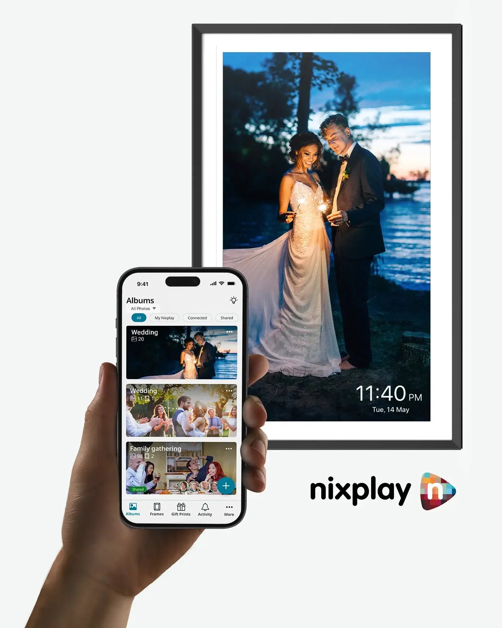 Apolosign 15.6" digital photo frame displaying wedding couple with sparklers, hand holding phone with Nixplay app interface.