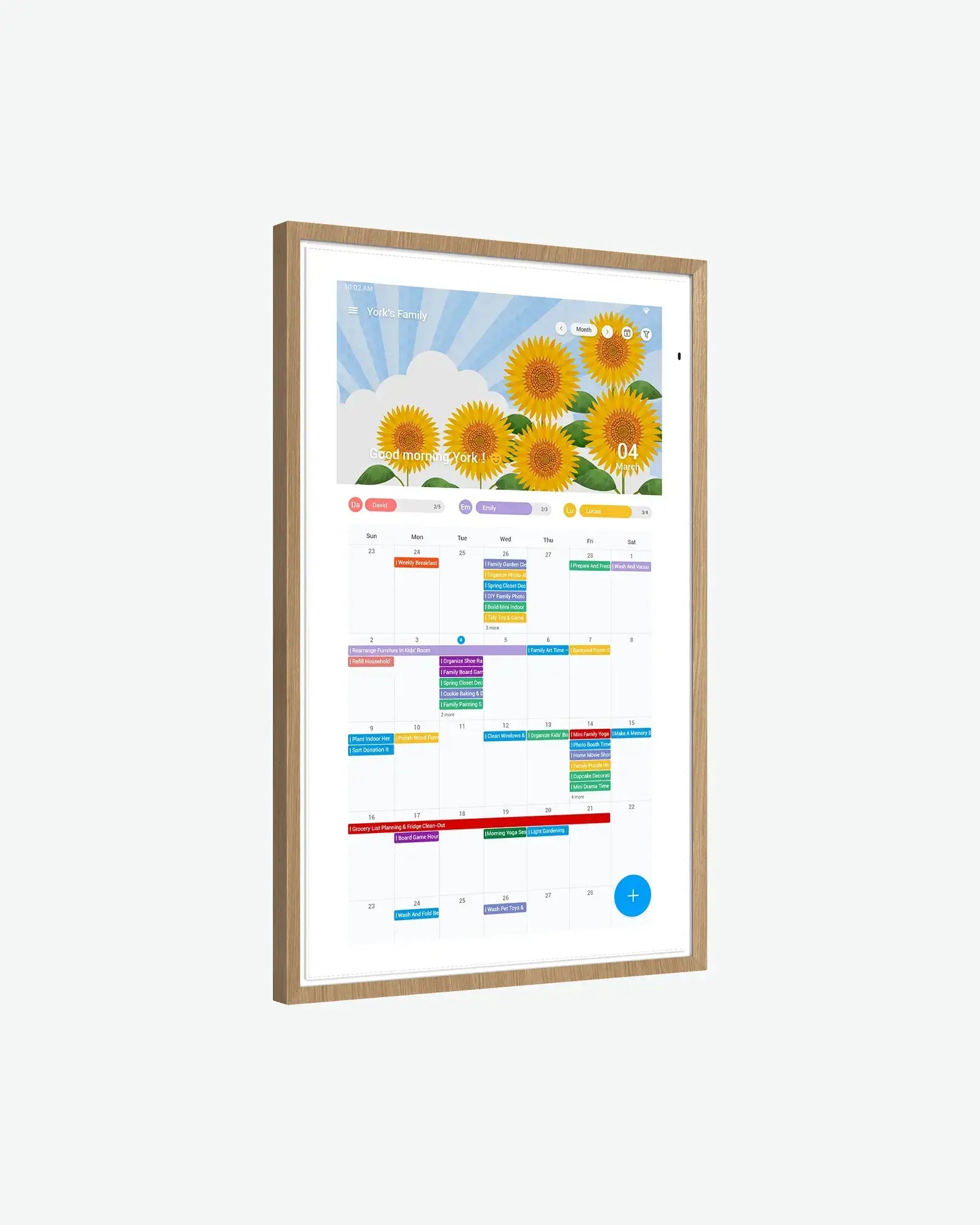 21.5 inch smart digital calendar with oak frame displaying a colorful calendar interface and sunflower screensaver.