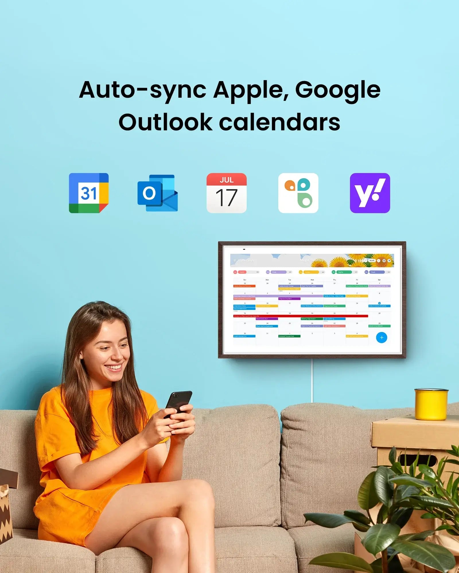 Woman smiles using phone, Apolosign 27" 4K digital calendar syncs Apple, Google, Outlook calendars with icons.