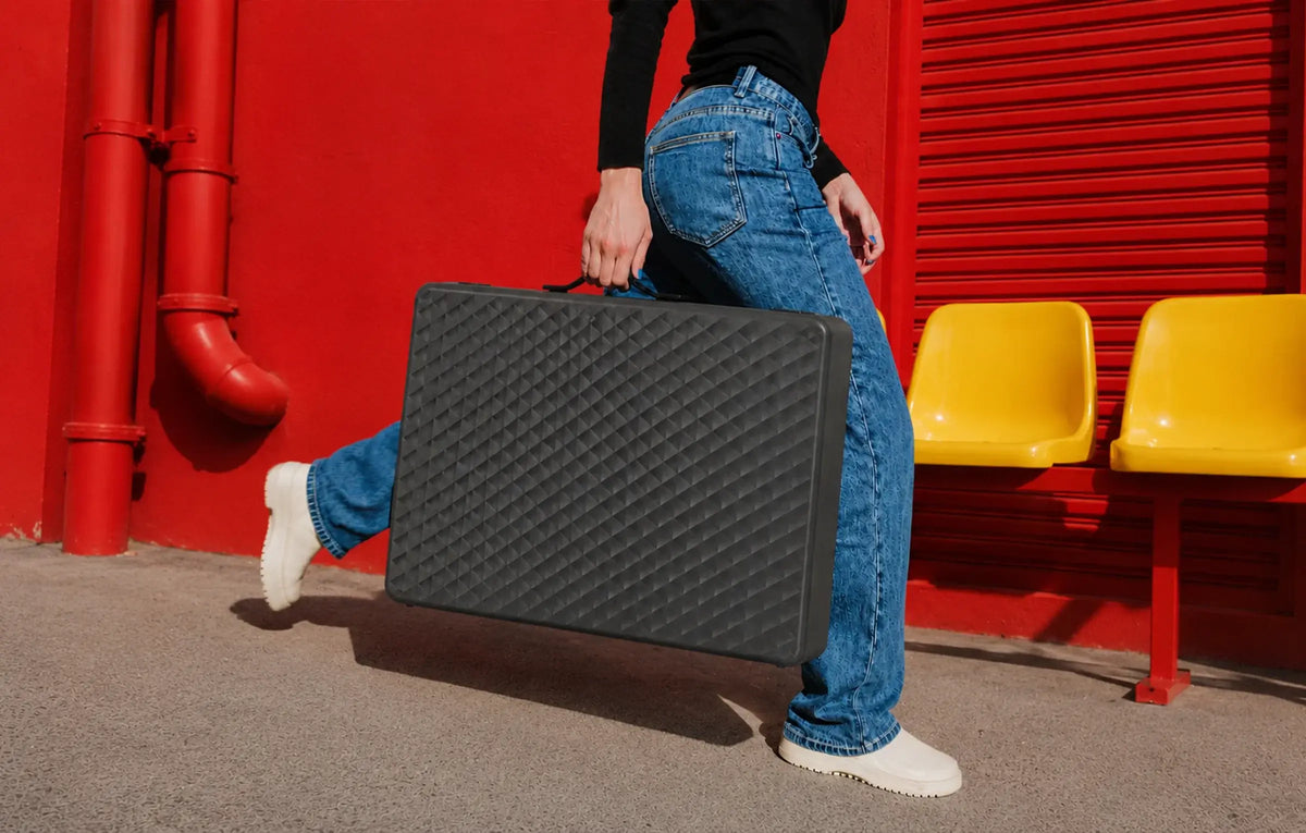 Briefcase‑style Apolosign portable TV in hard‑shell travel case for outdoor portable usage