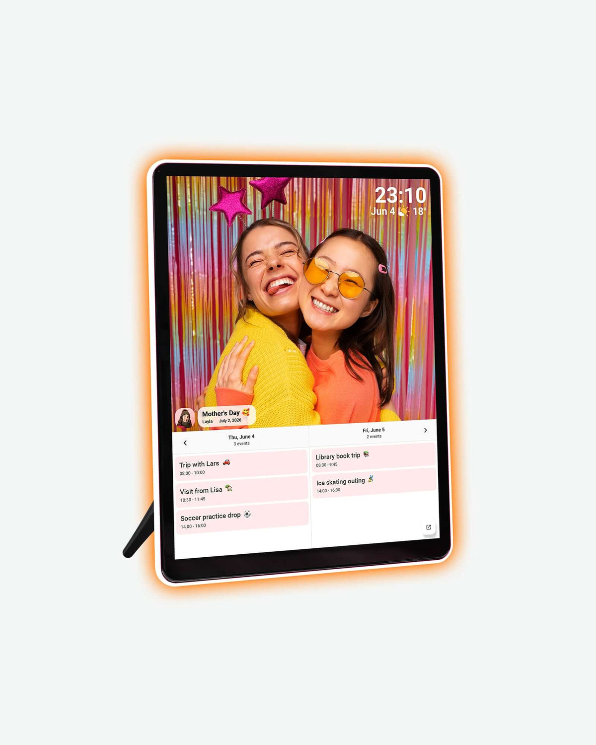 Orange-glow neon frame with two women hugging above a family calendar