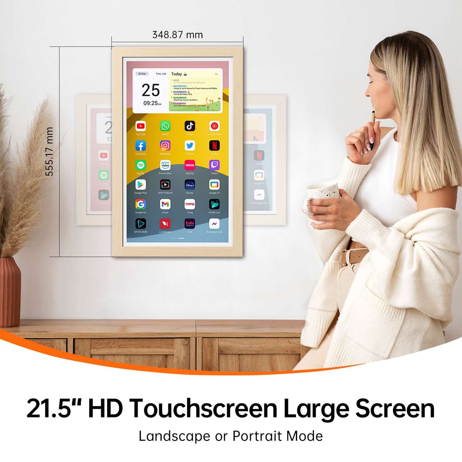 21.5" smart digital calendar, oak frame, app interface, date/time widget. Woman viewing.