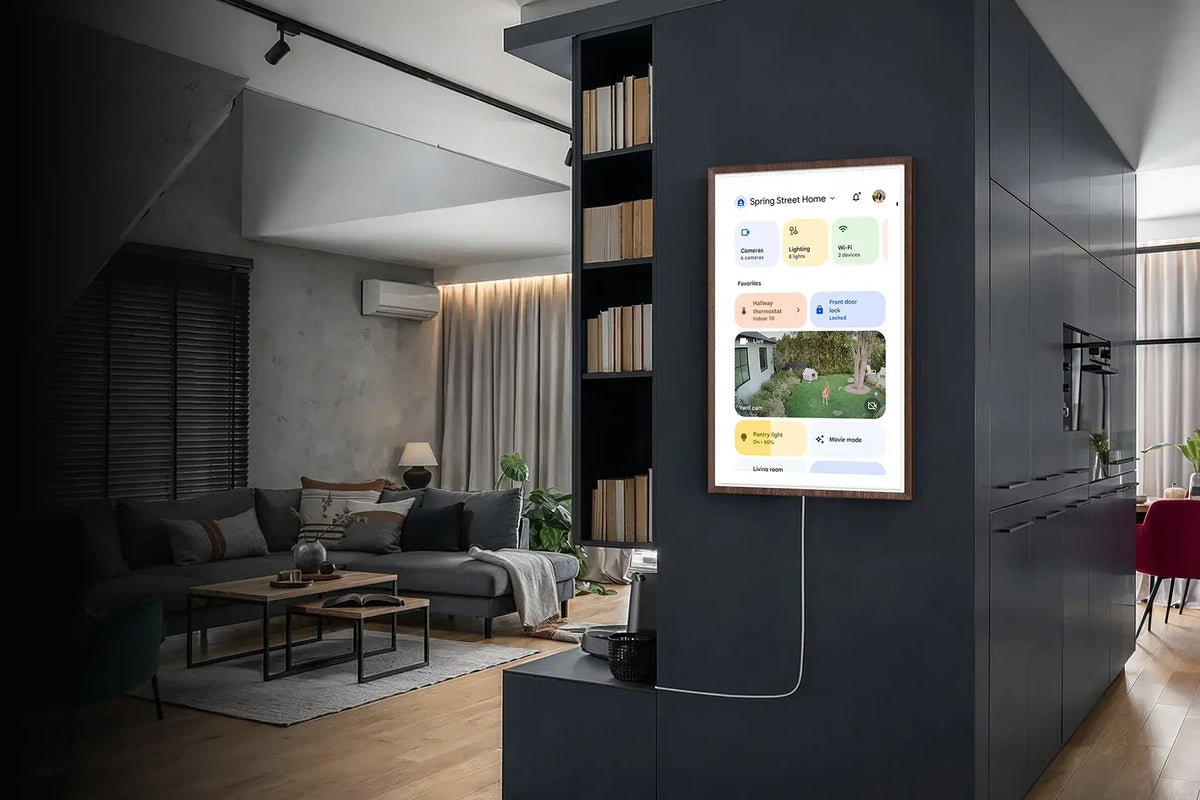 Wall-mounted Digital Calendar displaying smart home controls in a modern living room.
